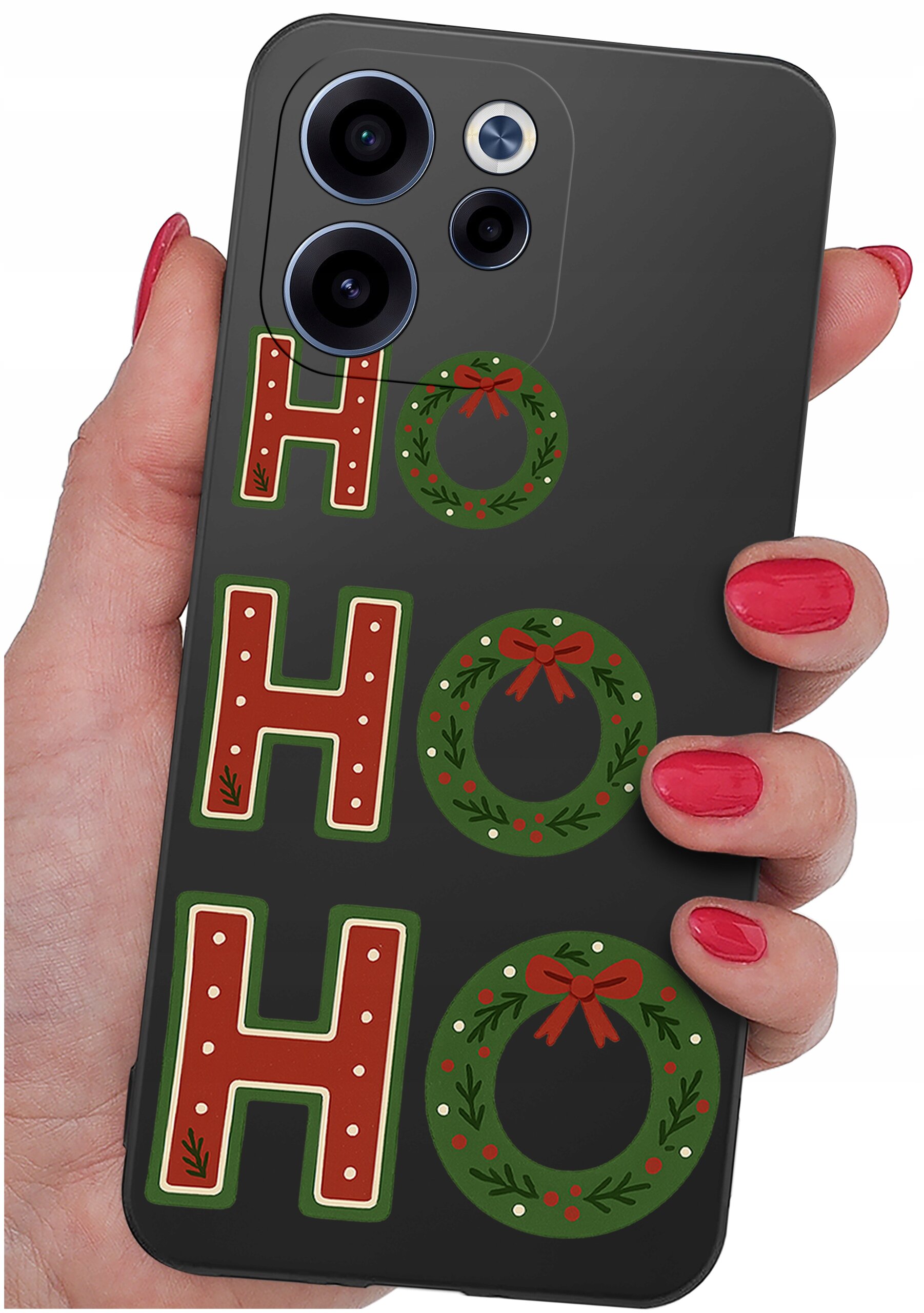 Czarna obudowa telefonu z napisem \'HO HO HO\' ozdobionym świątecznymi wieńcami i trzymana w dłoni z czerwonymi paznokciami.