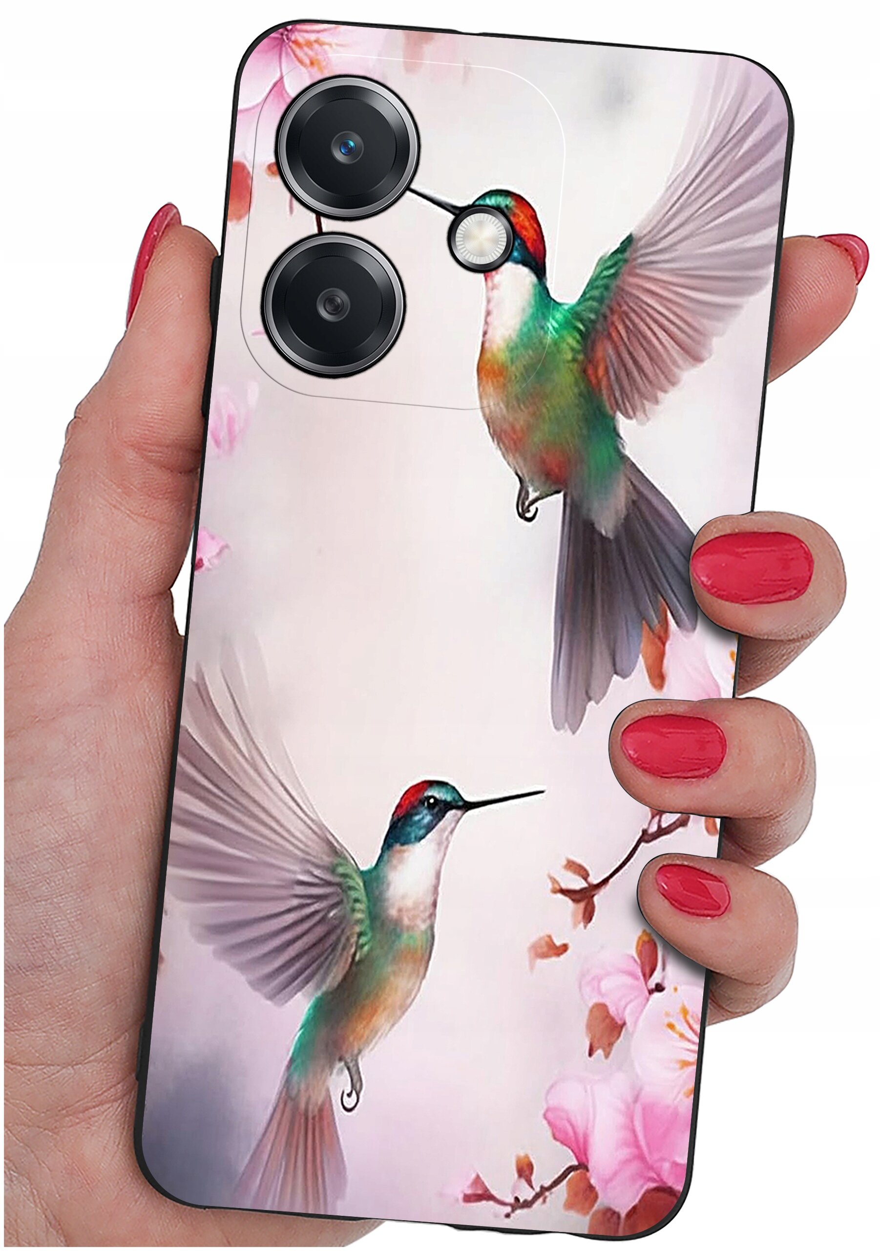 Etui na telefon z kolorowym wzorem przedstawiającym dwa kolibry w locie na tle kwiatów. Etui jest trzymane w dłoni z pomalowanymi na czerwono paznokciami.