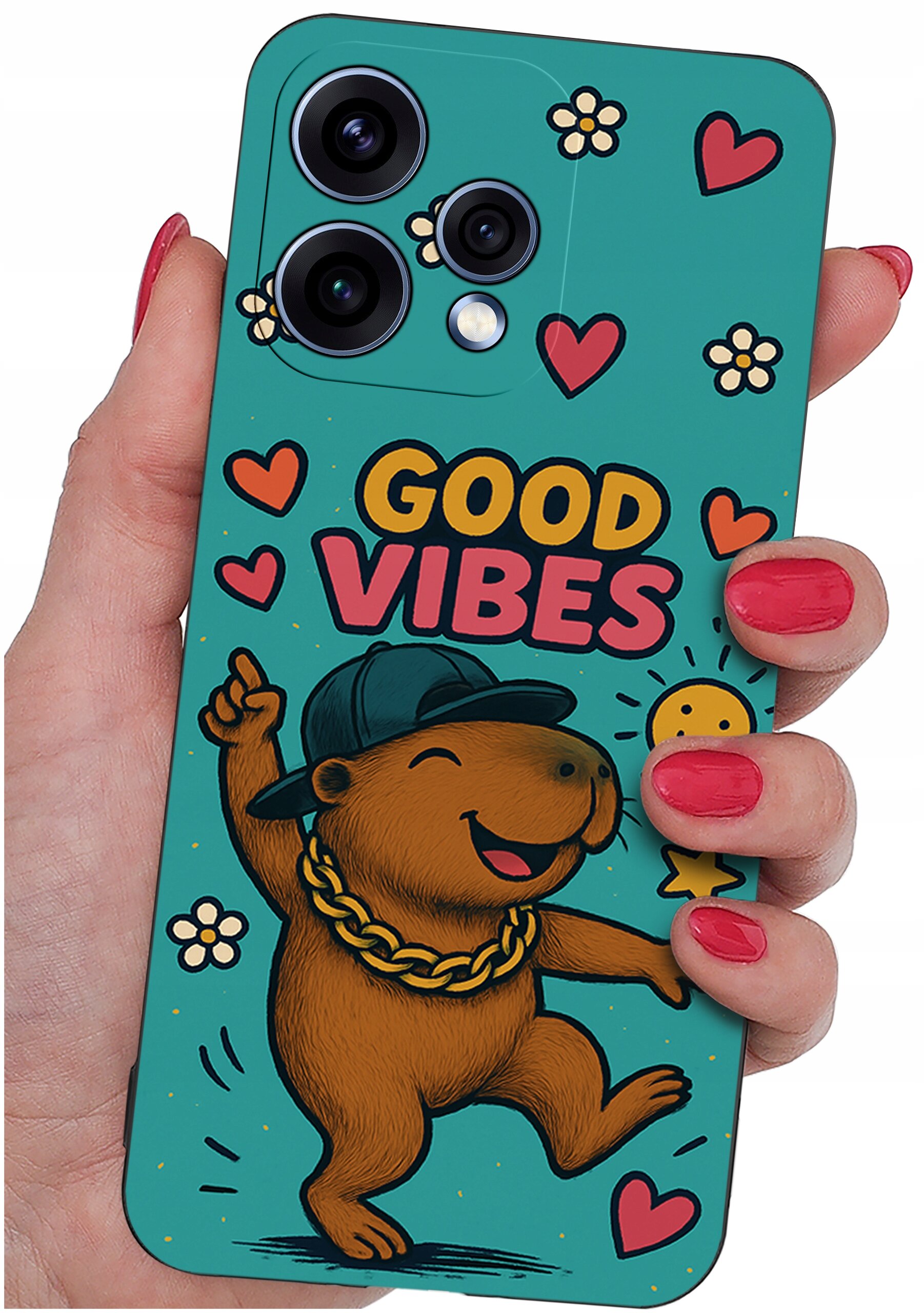 Etui na telefon z grafiką przedstawiającą uśmiechniętego zwierzaka w czapce i złotym łańcuchu, otoczonego sercami i kwiatkami. Na etui widnieje napis \'GOOD VIBES\'.