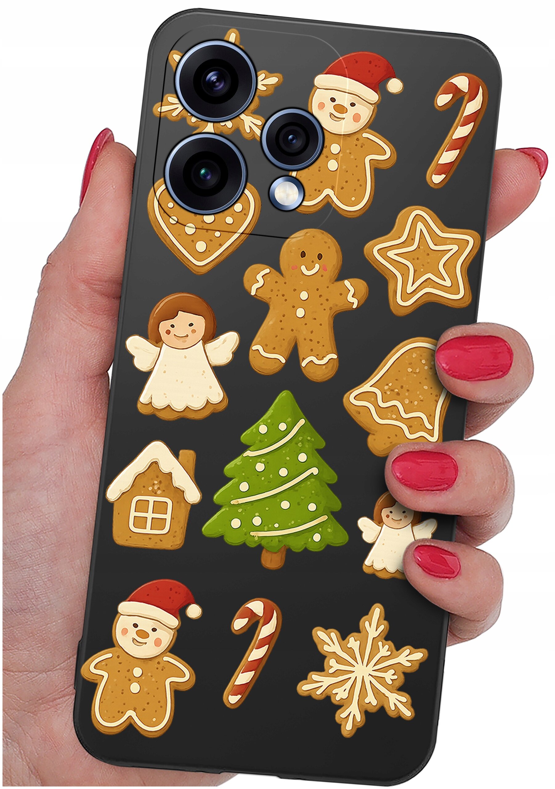 Etui na telefon z motywem świątecznych pierników, w tym choinki, aniołków i ludzików, trzymane w dłoni z pomalowanymi na czerwono paznokciami. Etui ma wycięcia na trzy obiektywy aparatu.