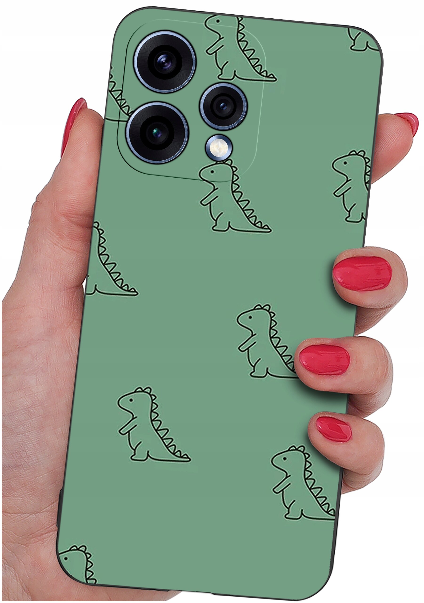 Osoba trzyma telefon z zielonym etui ozdobionym wzorem małych dinozaurów. Etui ma wycięcia na trzy obiektywy aparatu.