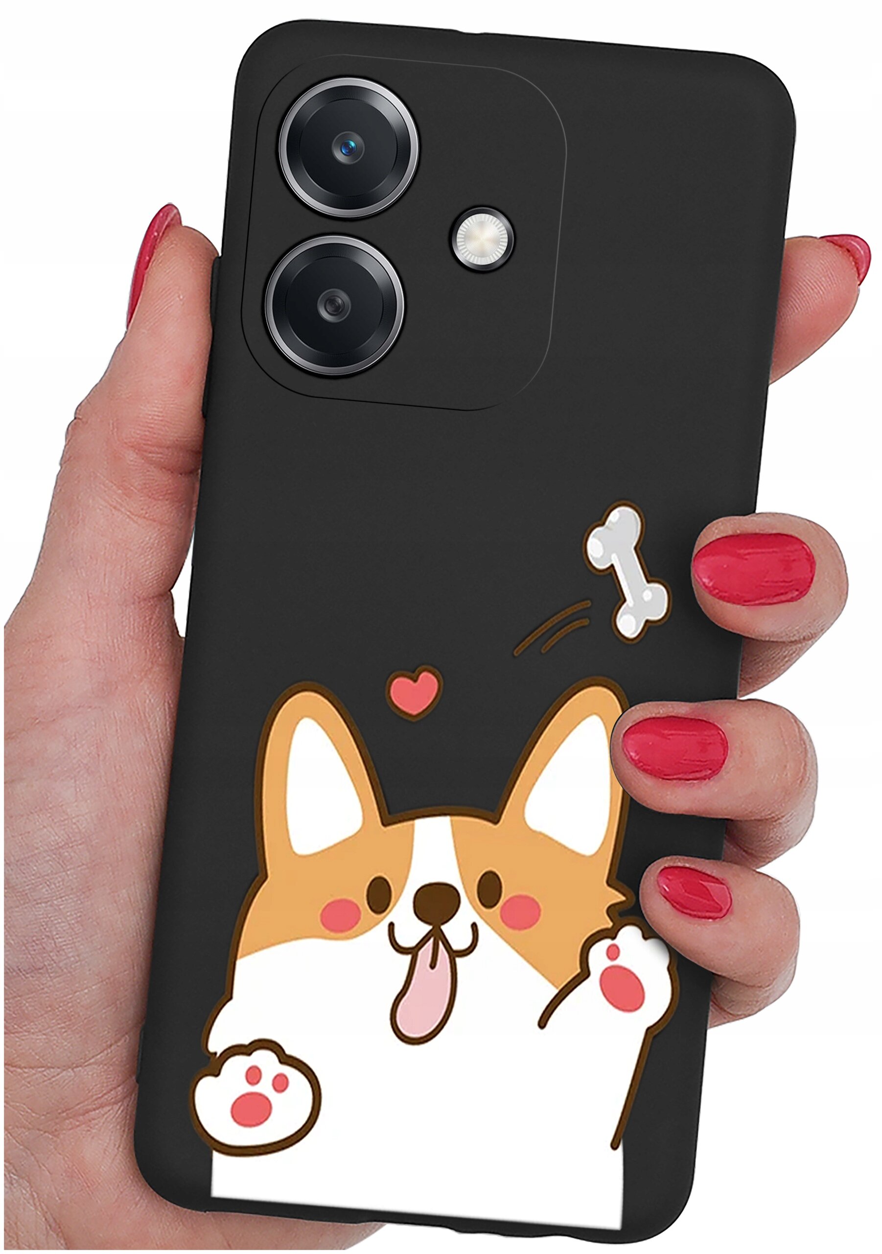 Czarne etui na telefon z grafiką przedstawiającą uśmiechniętego psa z wystawionym językiem, sercem i kością. Etui trzymane jest w dłoni z pomalowanymi na czerwono paznokciami.