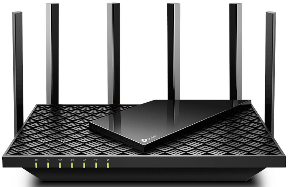Na obrazie widoczny jest czarny router z sześcioma pionowymi antenami i wzorem na górnej powierzchni. Na urządzeniu znajduje się logo TP-Link oraz kilka świecących diod na przednim panelu.
