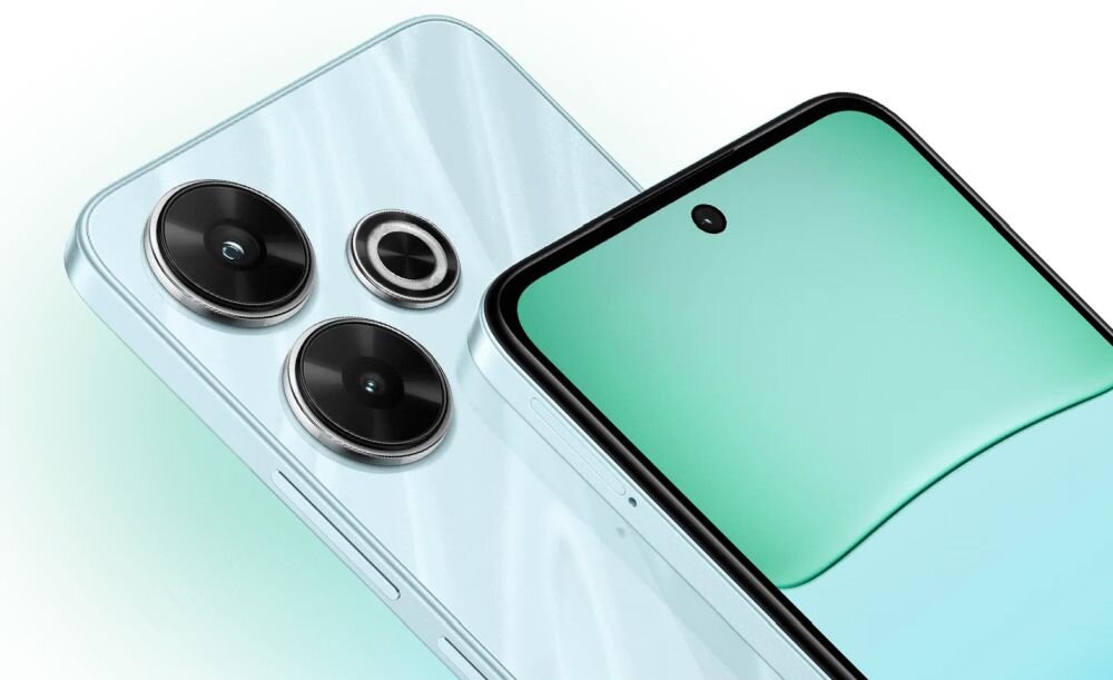 Na obrazie widoczny jest smartfon z dużym ekranem i trzema aparatami z tyłu. Obudowa ma jasny kolor z delikatnym połyskiem.
