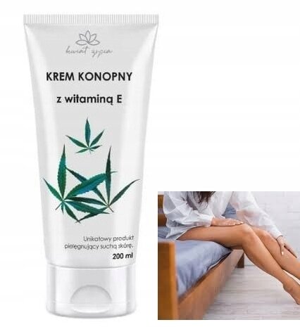 Na obrazie widoczna jest tubka kremu z napisem \'KREM KONOPNY z witaminą E 200 ml\' oraz grafiką liści konopi. Obok znajduje się zdjęcie osoby siedzącej na łóżku, dotykającej swoich nóg.