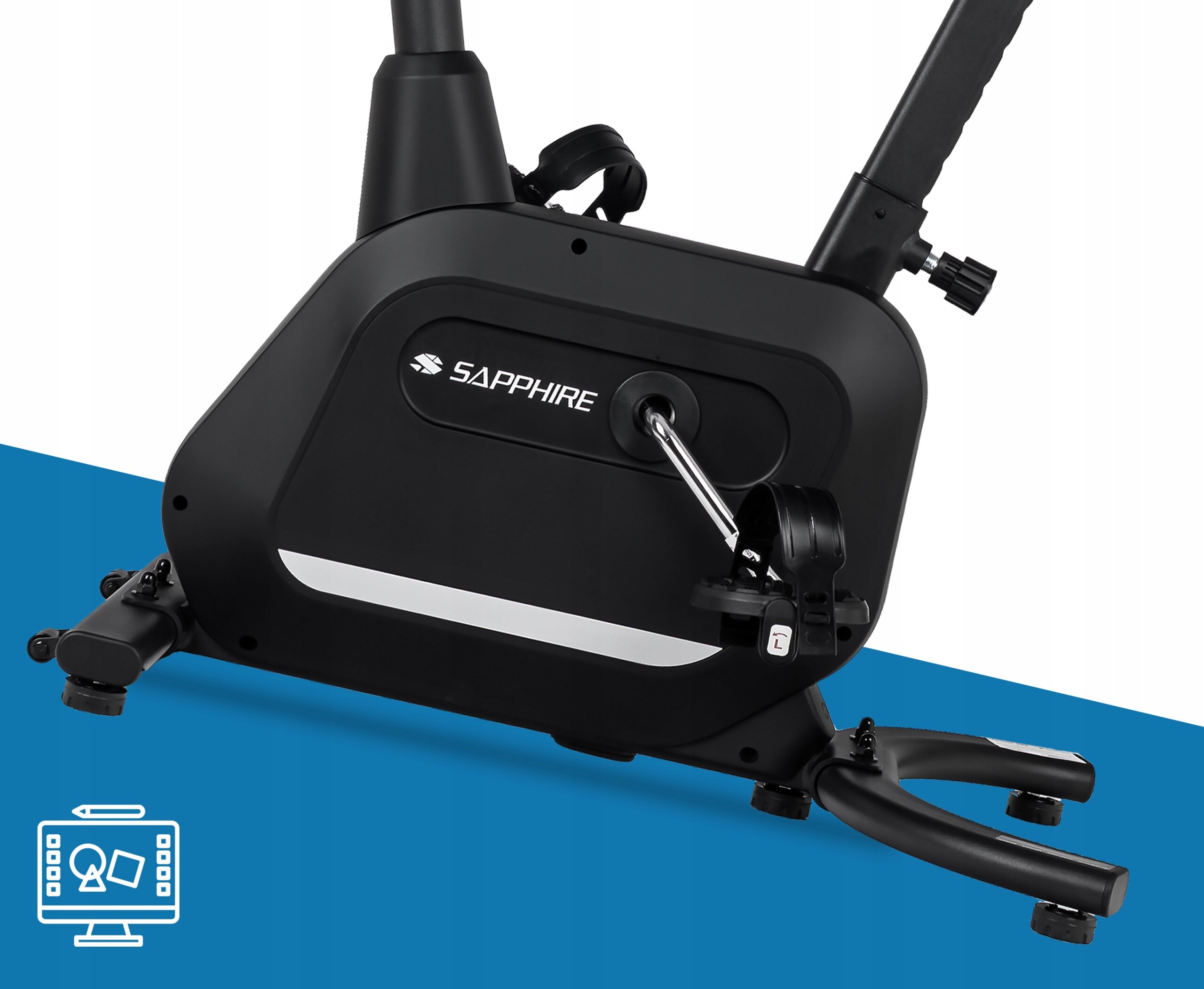 Czarny rower treningowy stacjonarny z logo \'SAPPHIRE\' na obudowie. Widoczna jest część mechanizmu pedałowania oraz stabilna podstawa urządzenia.