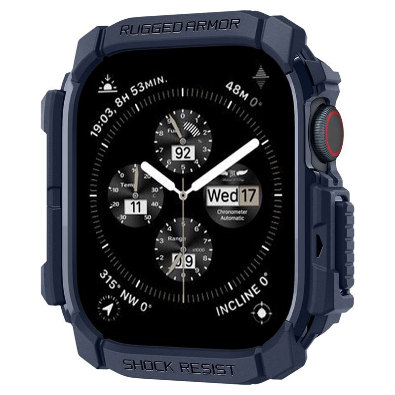 Zegarek z ciemnym wyświetlaczem i białymi wskazówkami, otoczony granatową obudową z napisem \'RUGGED ARMOR\' na górze i \'SHOCK RESIST\' na dole. Na tarczy widoczne są dodatkowe wskaźniki oraz data \'Wed 17\'.