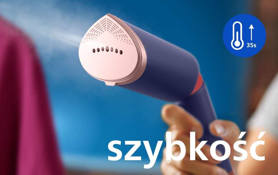 Osoba trzyma parownicę do ubrań, z której wydobywa się para. Na obrazie widoczny jest napis \'szybkość\' oraz ikona termometru z napisem \'35s\'.