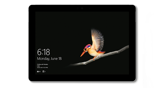Tablet z wyświetlaczem pokazującym kolorowego ptaka na gałęzi oraz tekst: \'6:18 Monday, June 18\'.