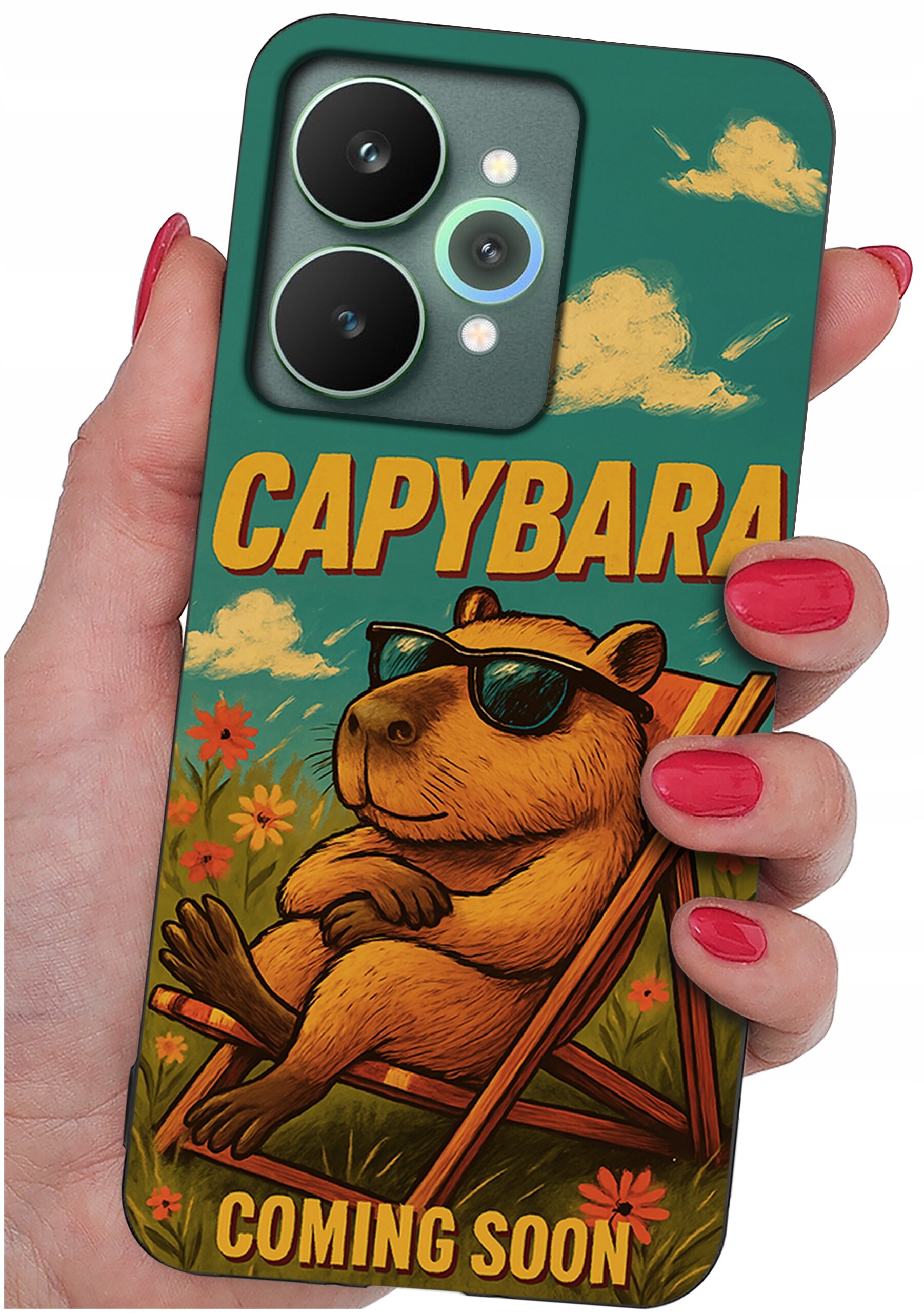Etui na telefon z grafiką kapibary w okularach przeciwsłonecznych, siedzącej na leżaku, z napisami \'CAPYBARA\' i \'COMING SOON\'.