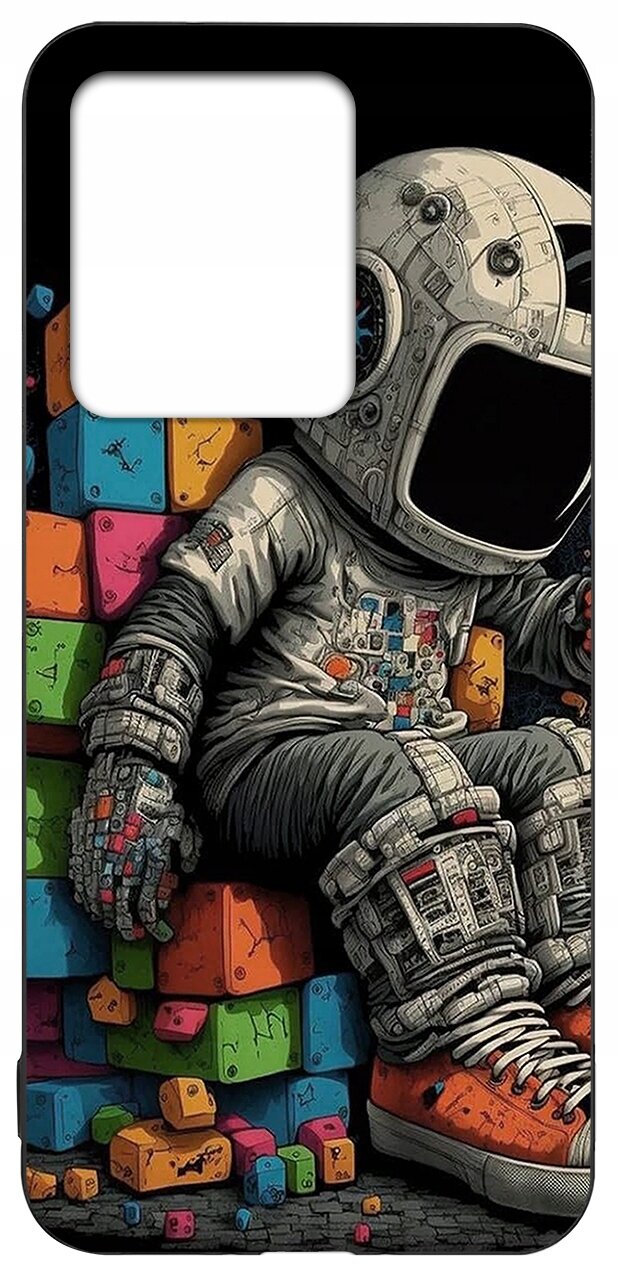 Etui przedstawia astronautę siedzącego na kolorowych klockach, ubrany w szczegółowy skafander kosmiczny z pomarańczowymi butami. Tło składa się z różnobarwnych, geometrycznych kształtów.
