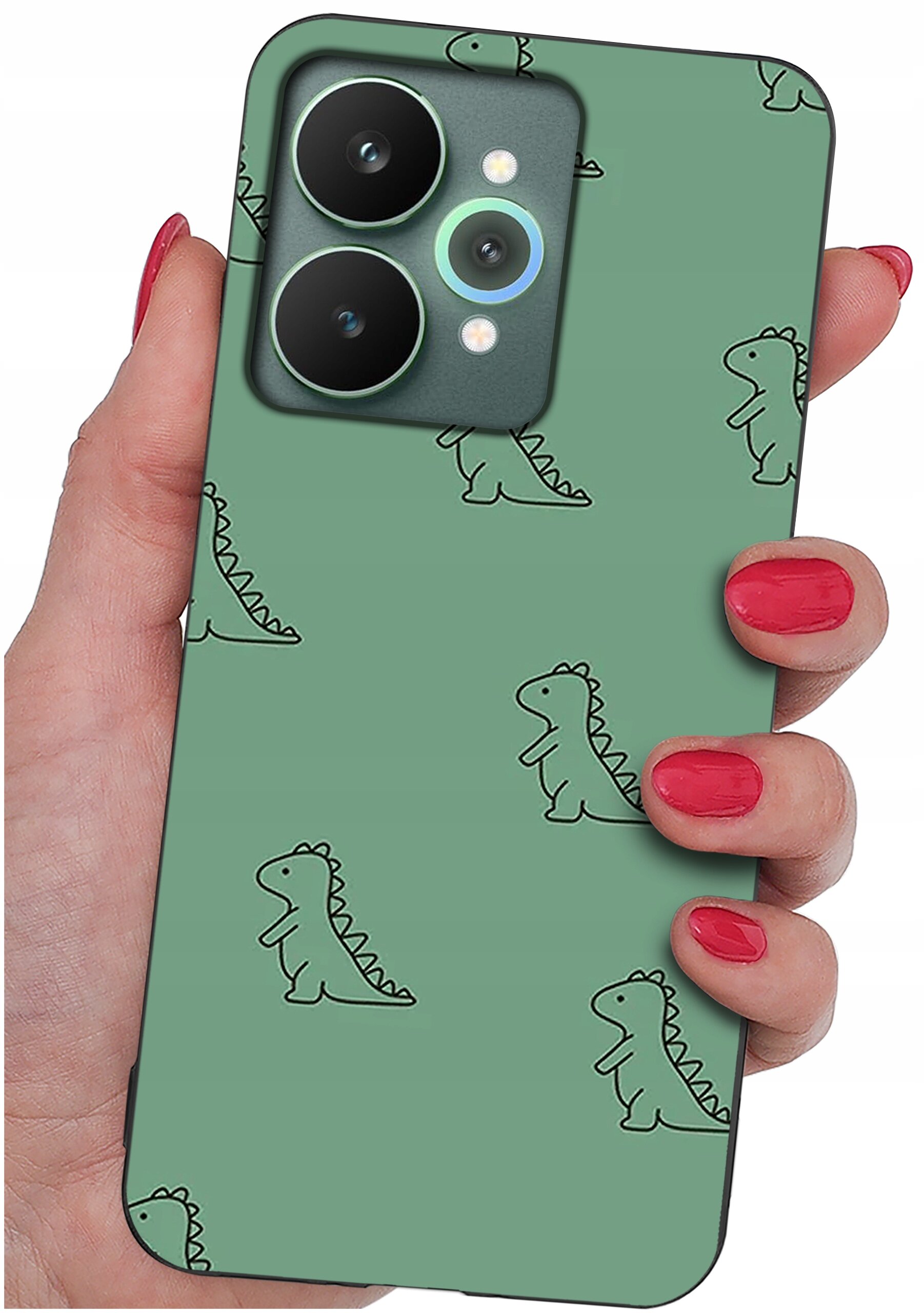 Osoba trzyma telefon z zielonym etui ozdobionym wzorem małych dinozaurów. Etui ma matowe wykończenie i wycięcia na aparat.