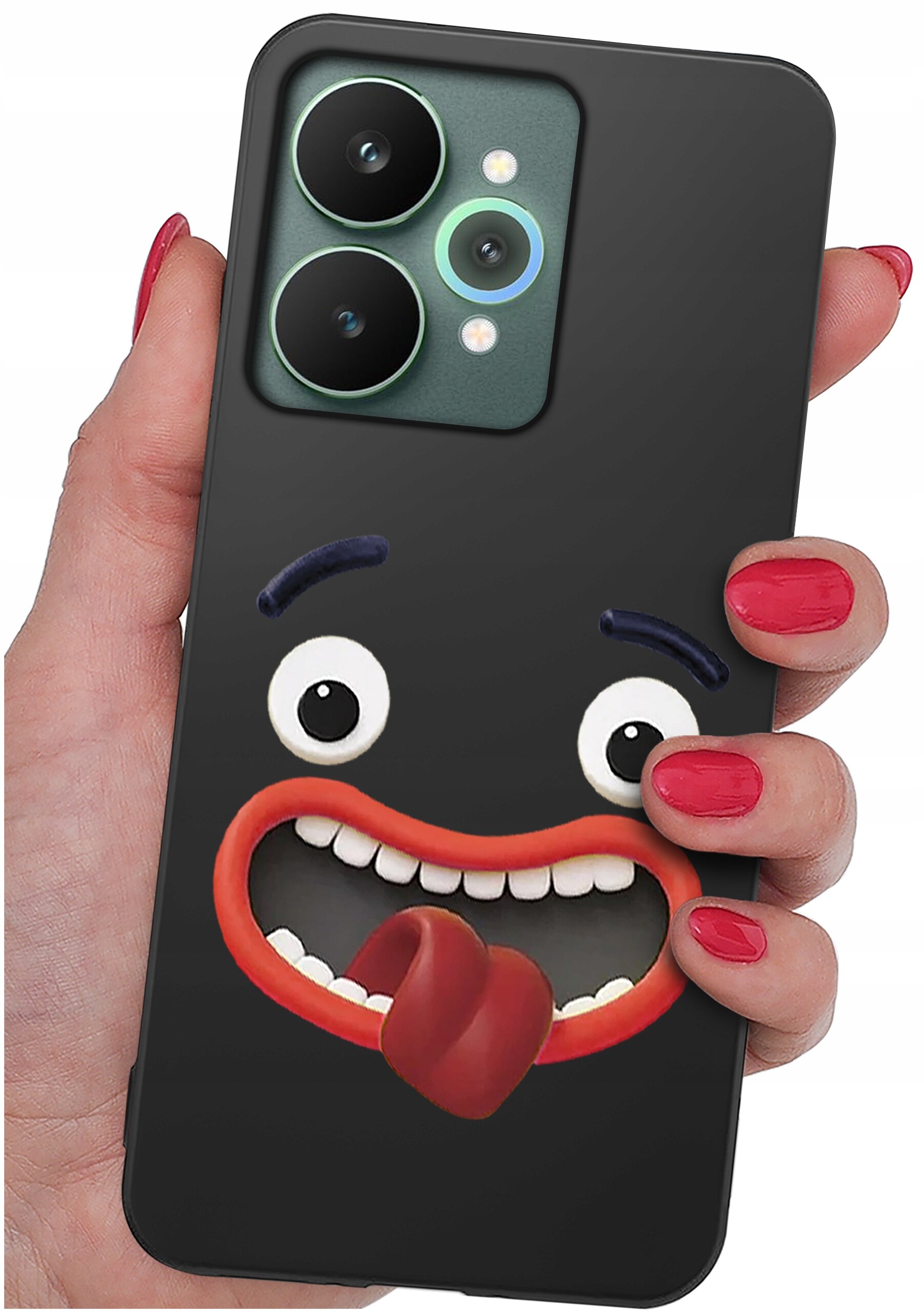 Osoba trzyma telefon z czarnym etui, na którym znajduje się rysunek uśmiechniętej twarzy z wystawionym językiem. Etui ma wycięcia na dwa duże obiektywy aparatu.