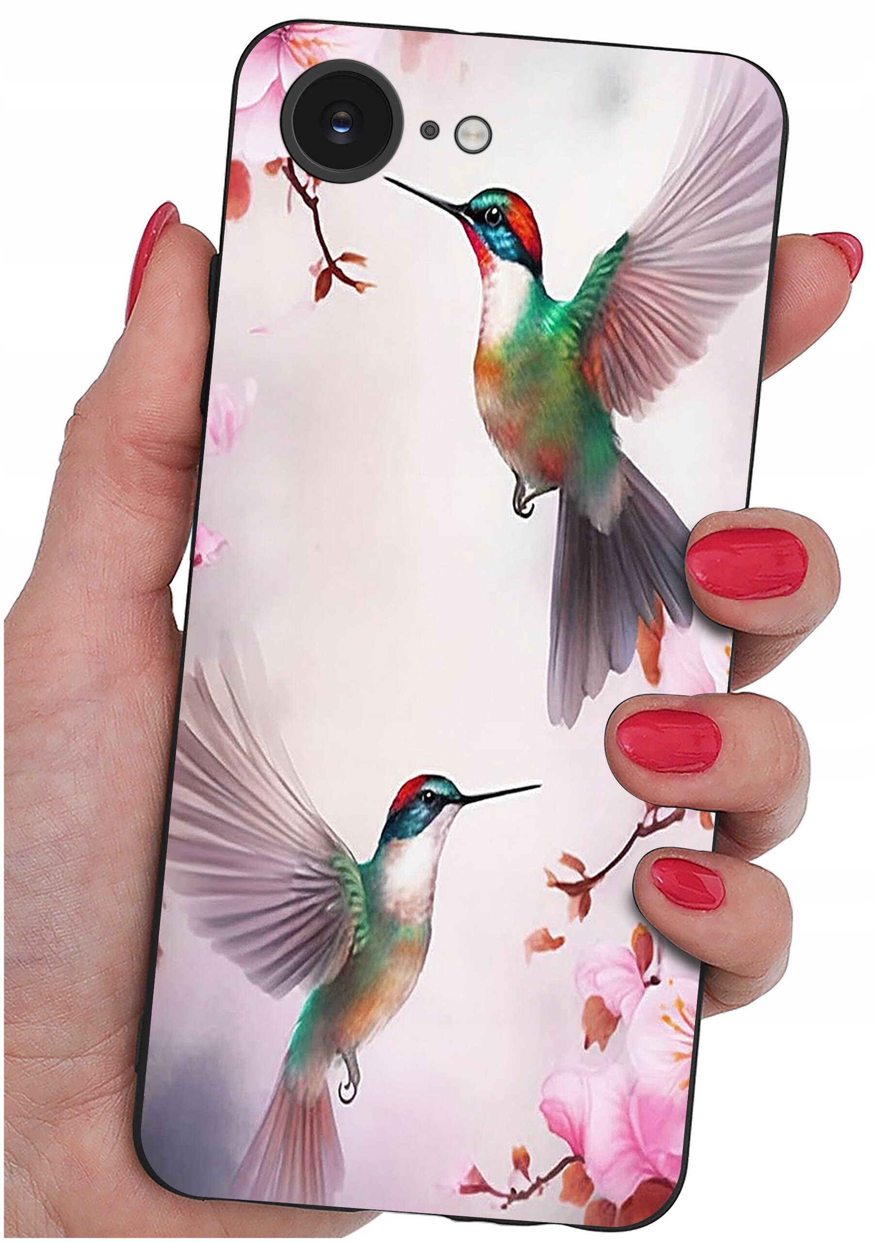 Etui na telefon z kolorowym wzorem przedstawiającym dwa kolibry wśród różowych kwiatów. Etui trzymane jest w dłoni z pomalowanymi na czerwono paznokciami.