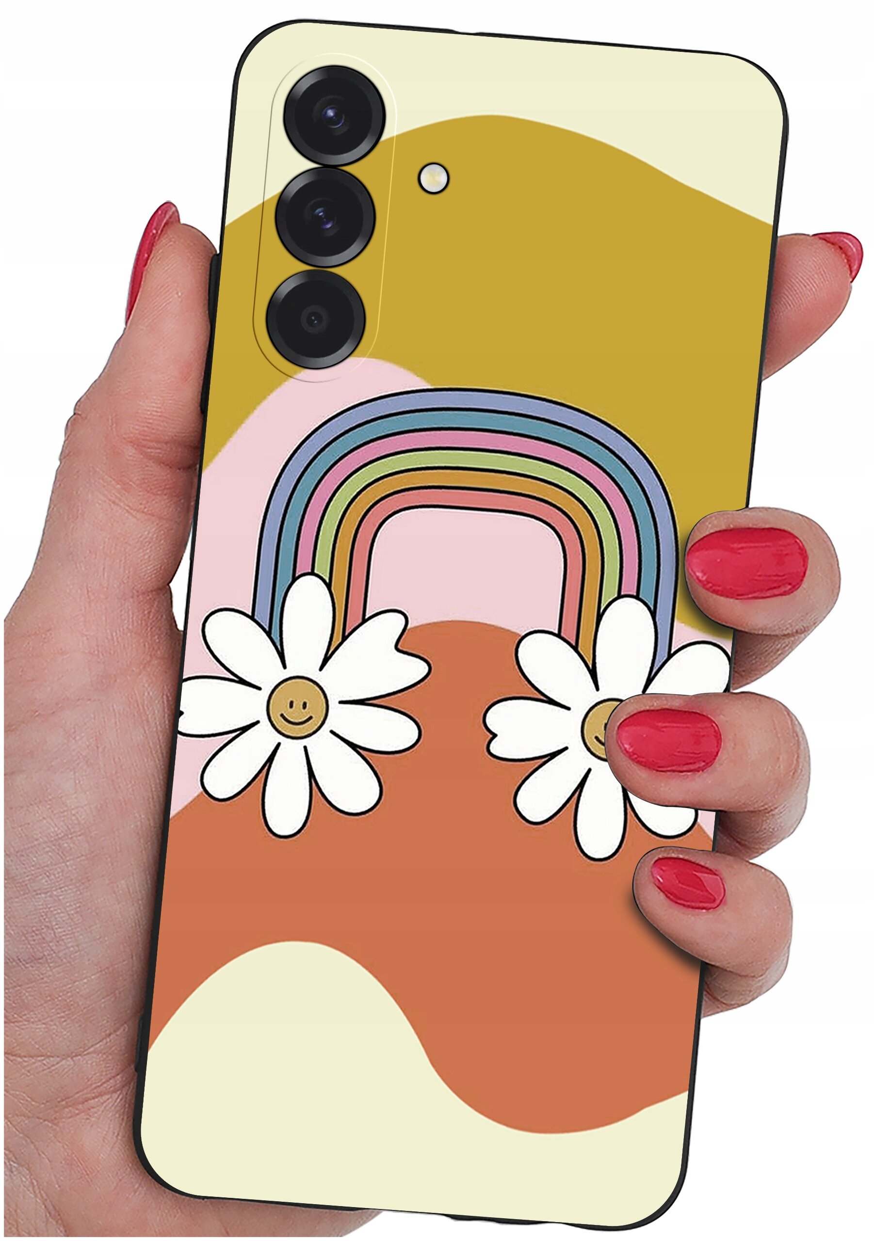 Etui na telefon z kolorowym wzorem tęczy i dwoma kwiatami z uśmiechniętymi buźkami. Etui jest trzymane w dłoni z pomalowanymi na czerwono paznokciami.