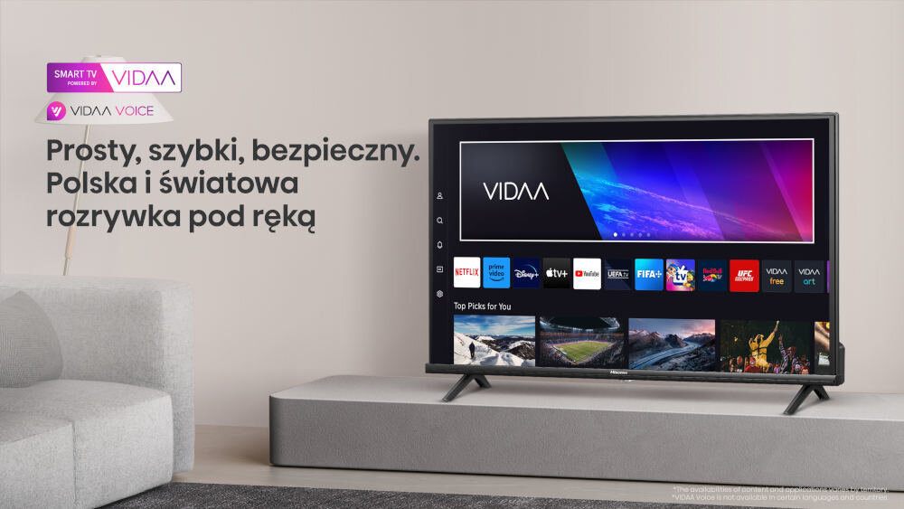 Telewizor wyświetla ekran główny z aplikacjami takimi jak Netflix, YouTube i Prime Video. Obok znajduje się tekst: \'Prosty, szybki, bezpieczny. Polska i światowa rozrywka pod ręką\'.