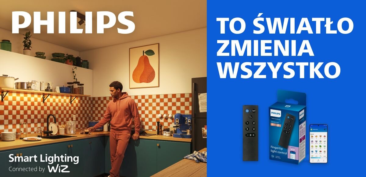 Reklama przedstawia kuchnię z osobą stojącą przy blacie, a obok widoczny jest pilot PHILIPS Smart 929002426821 WiZ oraz jego opakowanie. Tekst na obrazie: \'PHILIPS\', \'TO ŚWIATŁO ZMIENIA WSZYSTKO\', \'Smart Lighting Connected by WiZ\'.