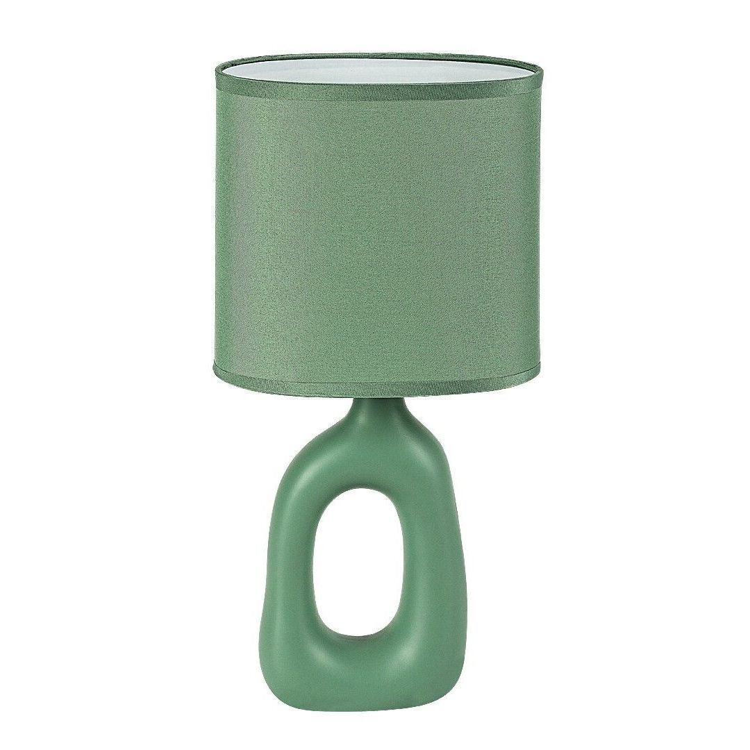 Zielona lampa stołowa z cylindrycznym abażurem i podstawą o nowoczesnym, otwartym kształcie. Lampa ma jednolity kolor i gładką powierzchnię.