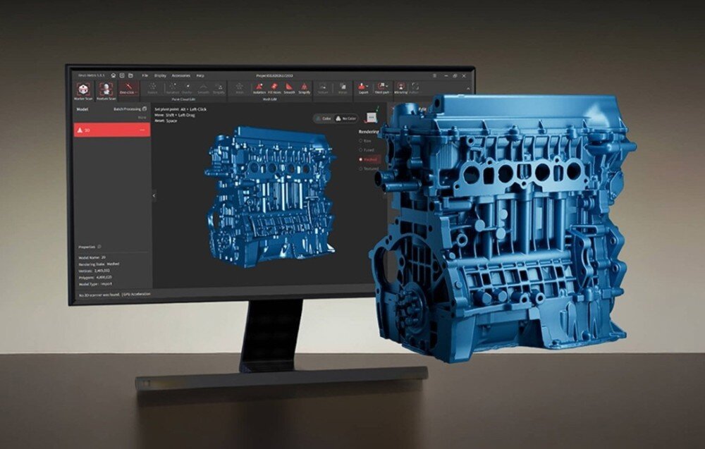 Na obrazie widoczny jest monitor z wyświetlonym modelem 3D silnika oraz rzeczywisty model 3D tego samego silnika w kolorze niebieskim. Interfejs na ekranie zawiera różne opcje i narzędzia do edycji modelu.