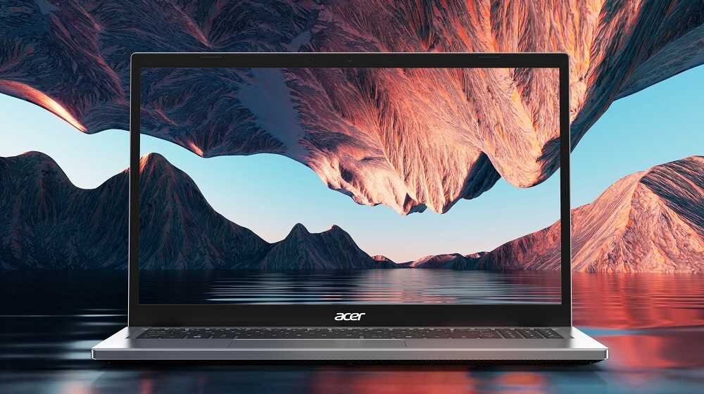 Laptop z widocznym logo \'acer\' na dolnej ramce ekranu, wyświetlający krajobraz z górami i wodą.