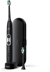Czarna szczoteczka soniczna z dwoma przyciskami na uchwycie, stojąca na stacji ładującej obok etui i dodatkowej końcówki. Na szczoteczce widoczne jest logo Philips.