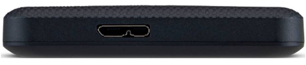 Obraz przedstawia zbliżenie na port USB w czarnym urządzeniu elektronicznym o teksturowanej powierzchni.