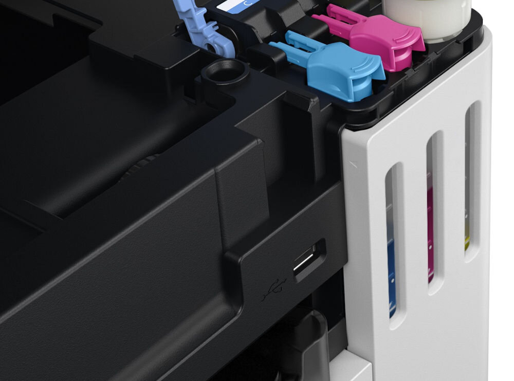 Fragment urządzenia wielofunkcyjnego z widocznymi kolorowymi pojemnikami na tusz oraz portem USB. Obudowa jest w kolorze czarnym i białym.