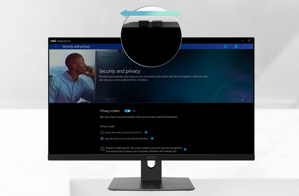 Monitor komputerowy z wyświetlonym ekranem ustawień \'Security and privacy\'. Na obudowie widoczne jest logo \'MSI\'.