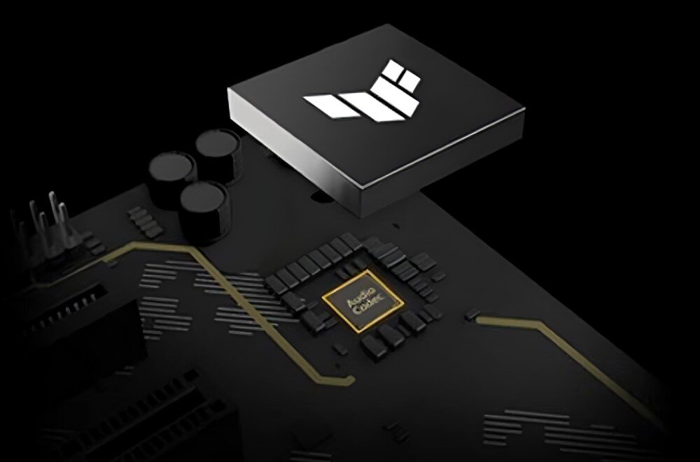 Obraz przedstawia fragment płyty głównej z widocznym logo TUF oraz napisem \'Audio Capacitor\'.