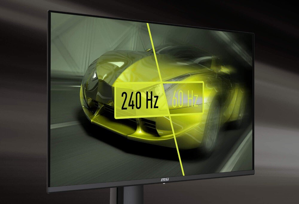 Monitor wyświetla obraz samochodu z podziałem na dwie części, z oznaczeniami \'240 Hz\' i \'60 Hz\'. Na dolnej ramce monitora widoczne jest logo \'msi\'.