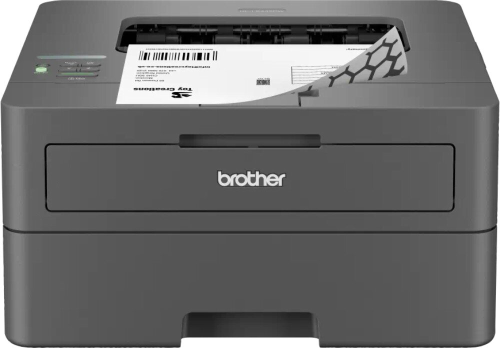 Na obrazie widoczna jest drukarka z logo \'brother\' na przednim panelu. Z urządzenia wystaje wydrukowana kartka z kodem kreskowym i tekstem \'Toy Creators\'.