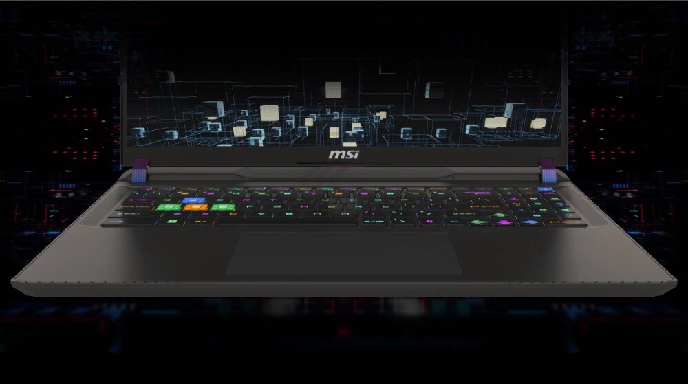 Laptop z logo \'msi\' na obudowie, z podświetlaną klawiaturą w różnych kolorach. W tle widoczna jest grafika z geometrycznymi kształtami i liniami.