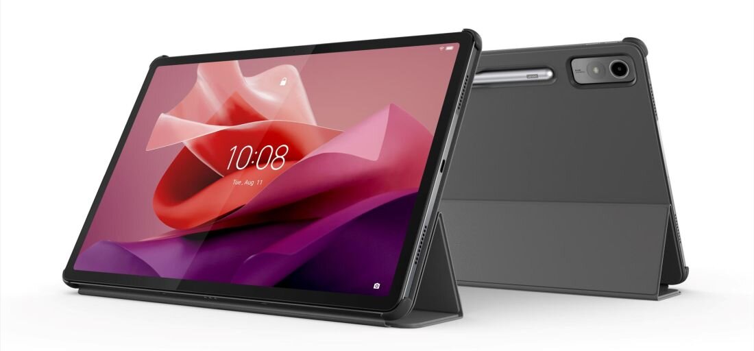 Na obrazie widoczny jest szary tablet z dużym ekranem, na którym wyświetlana jest godzina 10:08 i data Tue, Aug 17. Obok tabletu znajduje się jego tylna część z widocznym aparatem i etui w formie stojaka.
