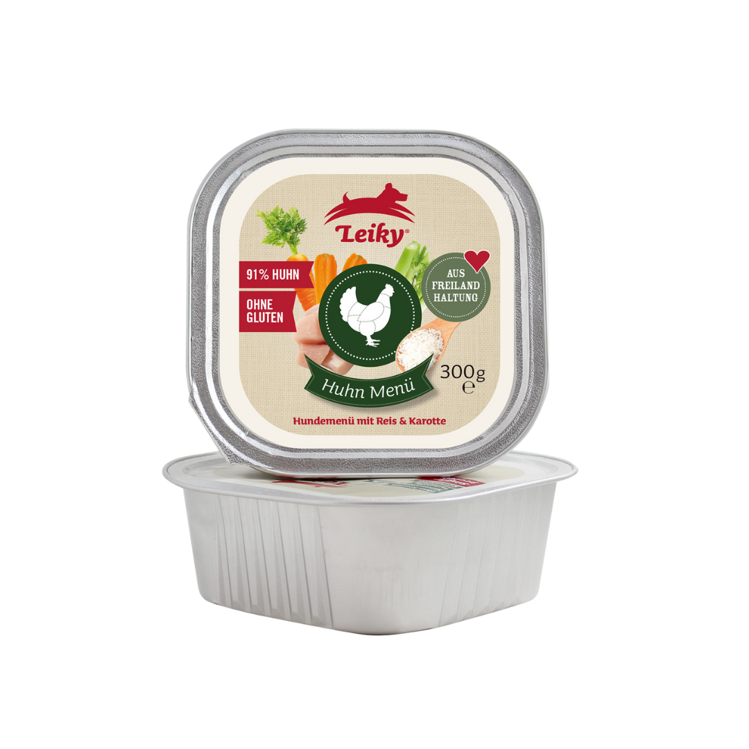 Opakowanie karmy dla psa o pojemności 300g z etykietą zawierającą napisy: \'Leiky\', \'91% Huhn\', \'Ohne Gluten\', \'Huhn Menü\', \'Aus Freiland Haltung\', \'Hundemenü mit Reis & Karotte\'.