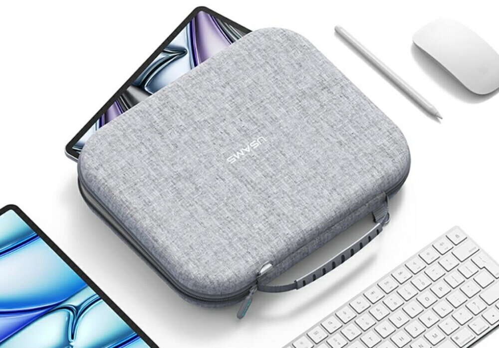 Na obrazie widoczne jest szare etui ochronne z napisem \'USAMS\', otoczone przez tablet, klawiaturę, myszkę i rysik. Etui ma teksturowaną powierzchnię i uchwyt do przenoszenia.