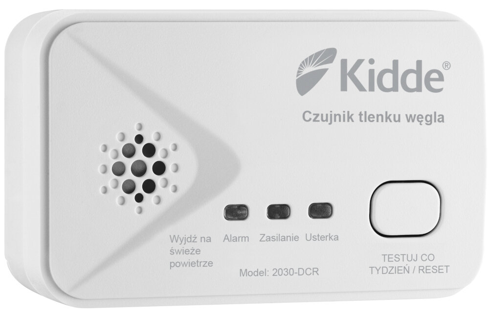 Biały czujnik tlenku węgla z logo \'Kidde\' i napisem \'Czujnik tlenku węgla\'. Widoczne są przyciski i wskaźniki z opisami: \'Wyjdź na świeże powietrze\', \'Alarm\', \'Zasilanie\', \'Usterka\', \'Model: 2030-DCR\', \'TESTUJ CO TYDZIEŃ / RESET\'.