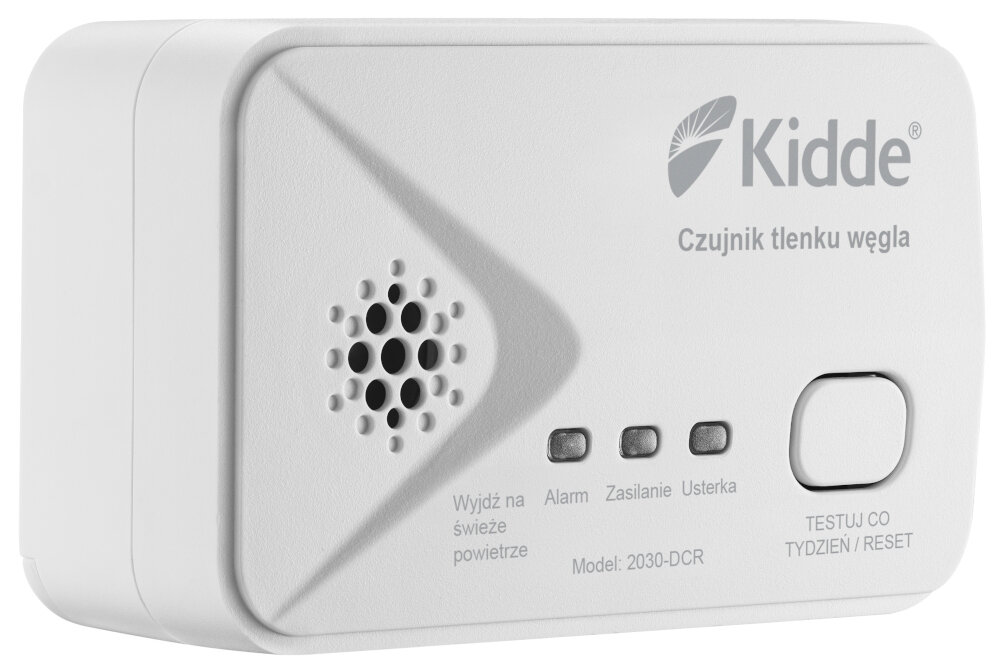 Biały czujnik tlenku węgla z logo \'Kidde\' i napisem \'Czujnik tlenku węgla\'. Widoczne są przyciski i diody oznaczone jako \'Alarm\', \'Zasilanie\', \'Usterka\', oraz przycisk \'TESTUJ CO Tydzień/Reset\'.