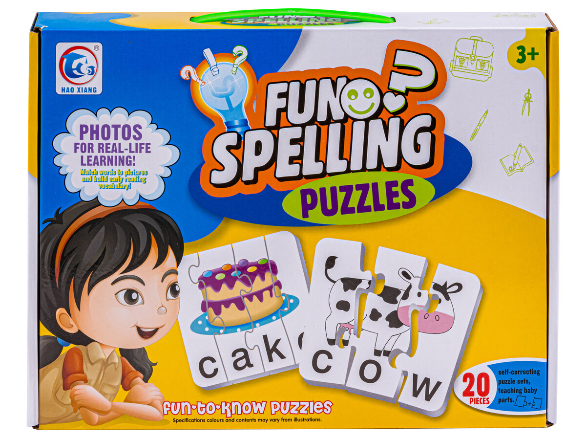 Opakowanie gry edukacyjnej z napisem \'FUN SPELLING PUZZLES\' oraz ilustracją dziecka i puzzli z obrazkami tortu i krowy. Na opakowaniu widnieje tekst \'PHOTOS FOR REAL-LIFE LEARNING!\' oraz informacja o 20 elementach.