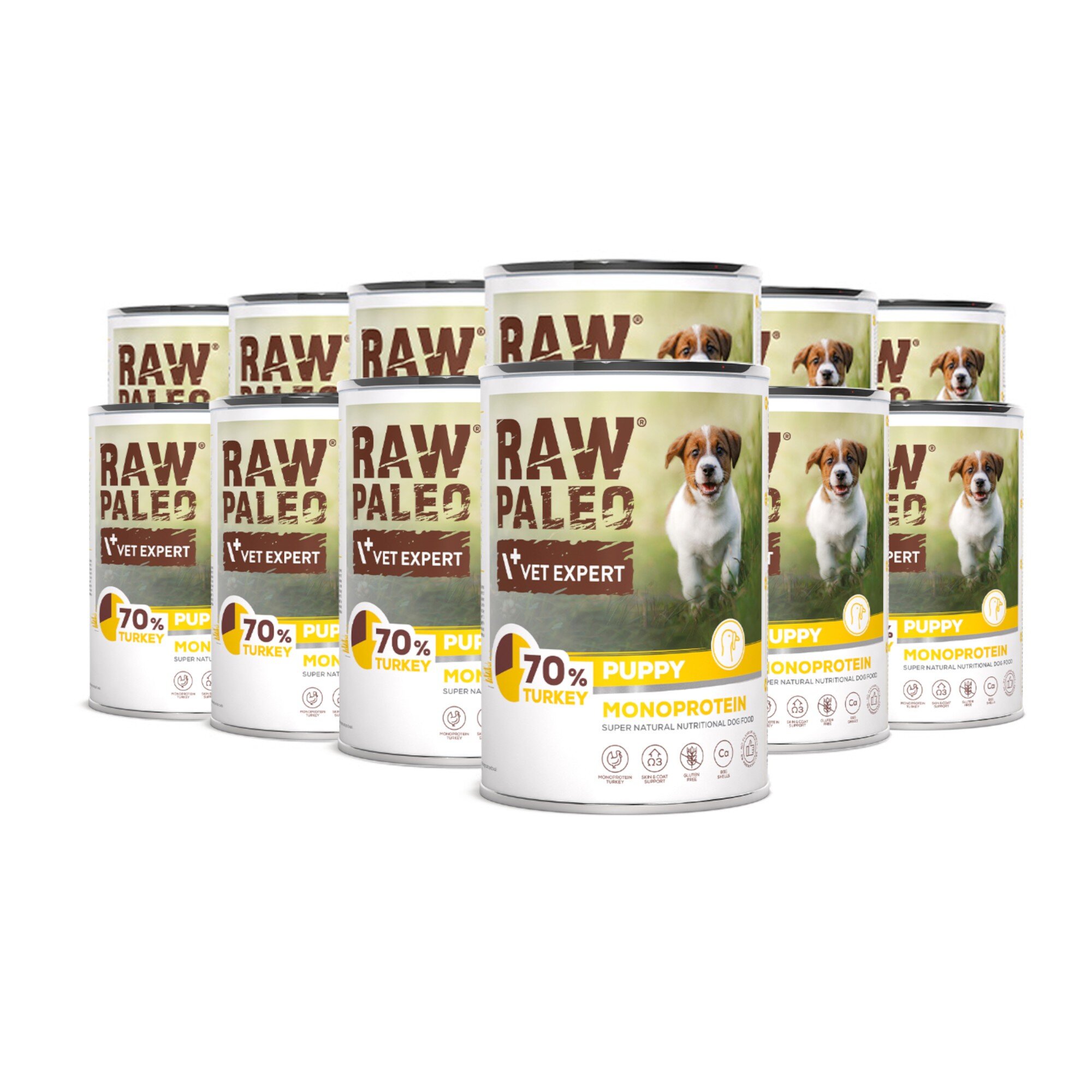 Na obrazie widoczne są puszki z karmą dla szczeniąt z napisem \'RAW PALEO VET EXPERT 70% TURKEY PUPPY MONOPROTEIN\'. Na etykiecie znajduje się zdjęcie szczeniaka na tle trawy.