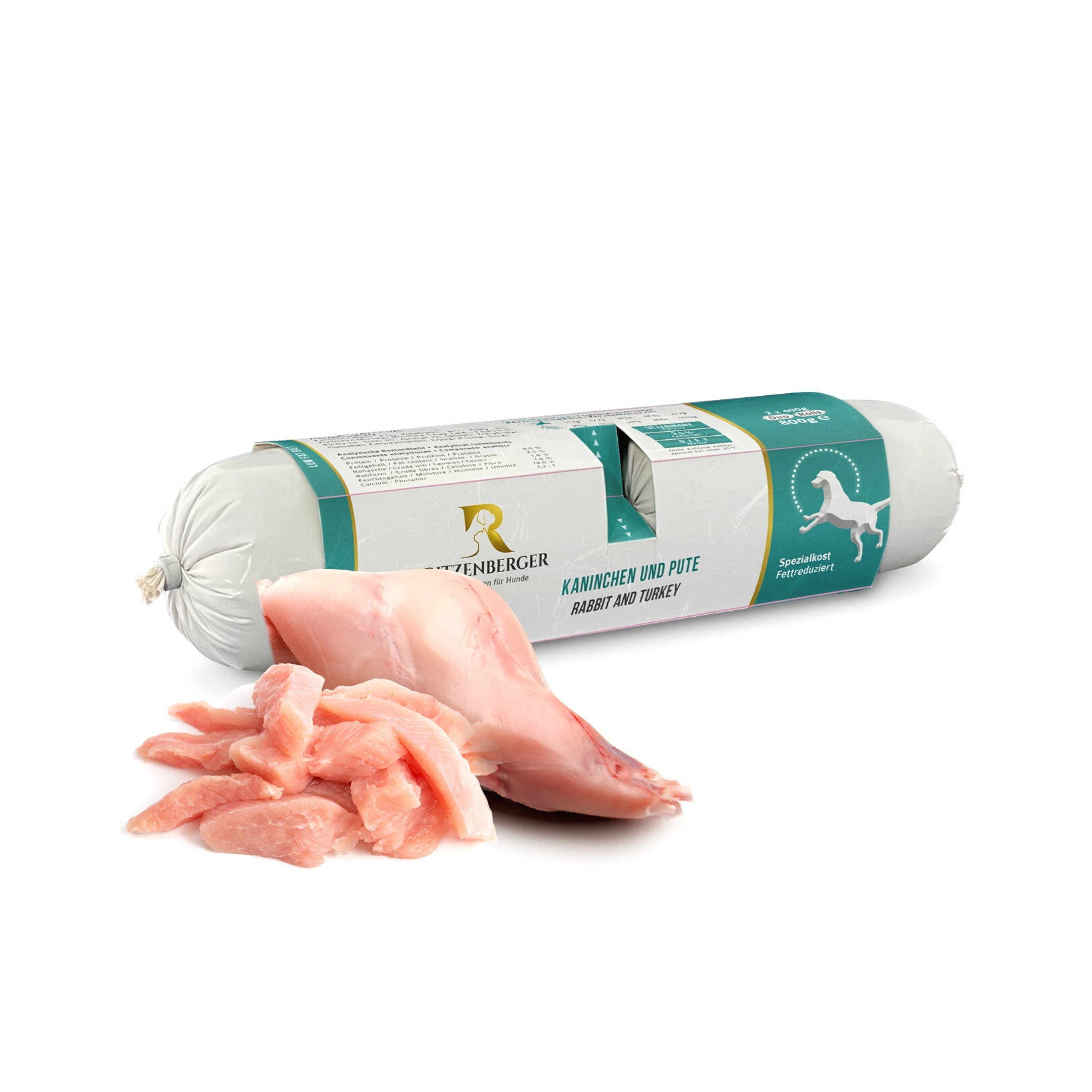Na obrazie widoczna jest rolka karmy dla psa z etykietą \'Ritzenberger\' oraz kawałki surowego mięsa. Na etykiecie napisano \'KANINCHEN UND PUTE RABBIT AND TURKEY\'.