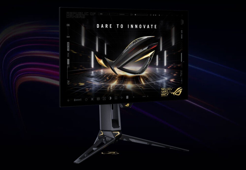 Monitor ASUS ROG Swift PG27AQWP-G Lekko obrócony monitor na ciemnym tle z rozmytymi fioletowymi smugami światła. Ekran wyświetla przestrzenne logo i napis 'DARE TO INNOVATE'