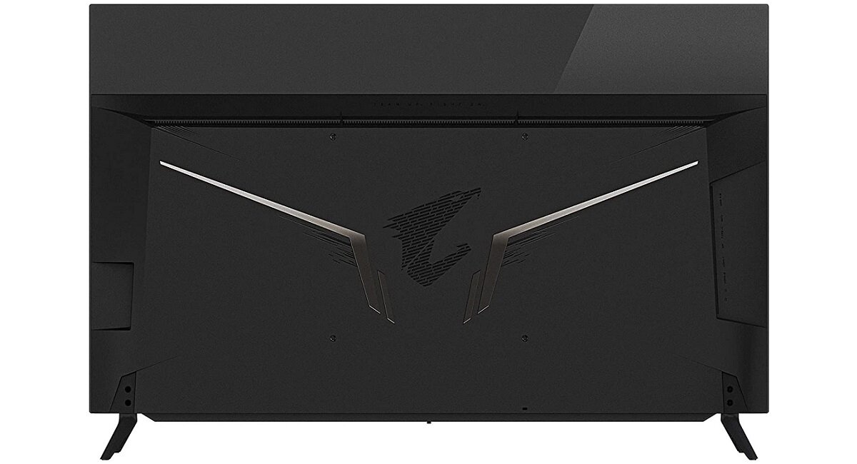 Tył czarnego monitora z widocznym logo w kształcie stylizowanej litery \'A\'. Monitor ma solidną podstawę i nowoczesny design.