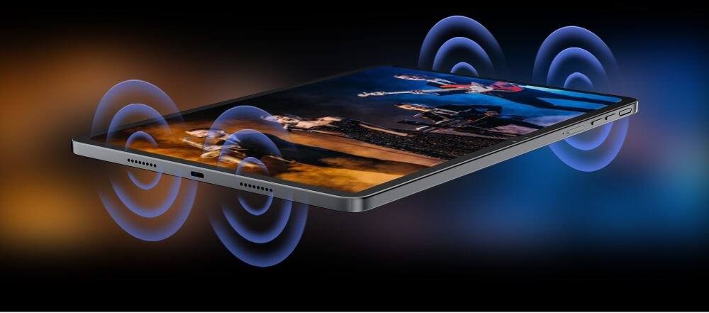 Obraz przedstawia tablet z wyświetlaczem pokazującym scenę koncertową. Wokół tabletu widoczne są graficzne fale dźwiękowe, sugerujące funkcję audio.