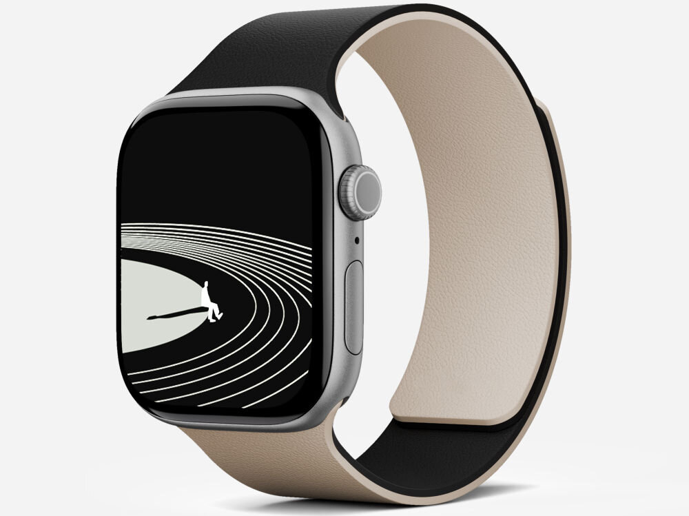 Smartwatch z czarno-białym paskiem i wyświetlaczem pokazującym grafikę z liniami i postacią. Pasek jest biało-czarny, a koperta zegarka ma metaliczny wygląd.