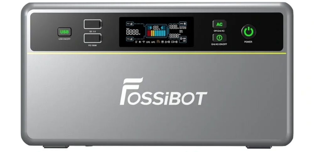 Na obrazie widoczna jest stacja zasilania w kolorze szarym z logo \'Fossibot\'. Na panelu znajdują się porty USB, wyświetlacz oraz przyciski zasilania oznaczone jako \'USB ON/OFF\', \'AC ON/OFF\' i \'POWER\'.