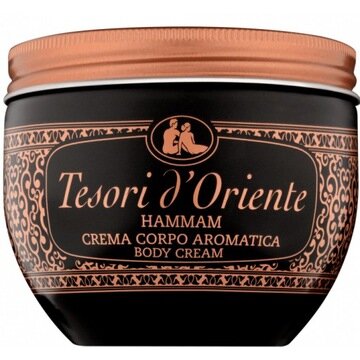 Czarny słoik z brązową zakrętką, na którym widnieje napis \'Tesori d\'Oriente HAMMAM CREMA CORPO AROMATICA BODY CREAM\'.