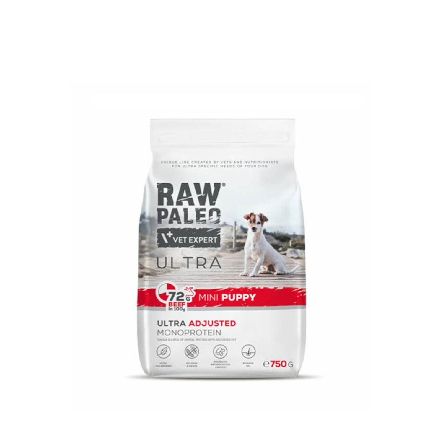 Opakowanie suchej karmy dla szczeniąt z wołowiną, z napisem \'RAW PALEO VET EXPERT ULTRA\'. Widoczny jest także pies oraz informacje o zawartości 72% wołowiny w 100g i waga 750g.