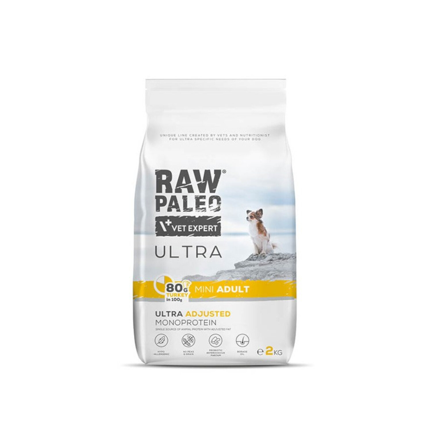 Opakowanie suchej karmy dla psów z napisem \'RAW PALEO VET EXPERT ULTRA\'. Widoczny jest również mały pies na tle nieba oraz informacje o składzie i wadze 2 kg.