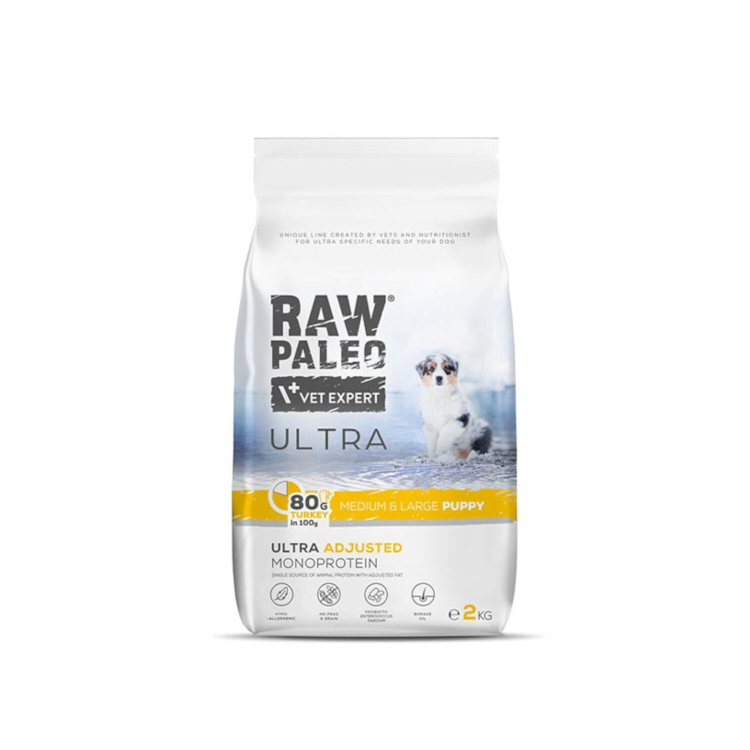 Opakowanie suchej karmy dla szczeniąt z napisem \'RAW PALEO VET EXPERT ULTRA\'. Widoczny jest obrazek psa oraz informacje o składzie i przeznaczeniu produktu.