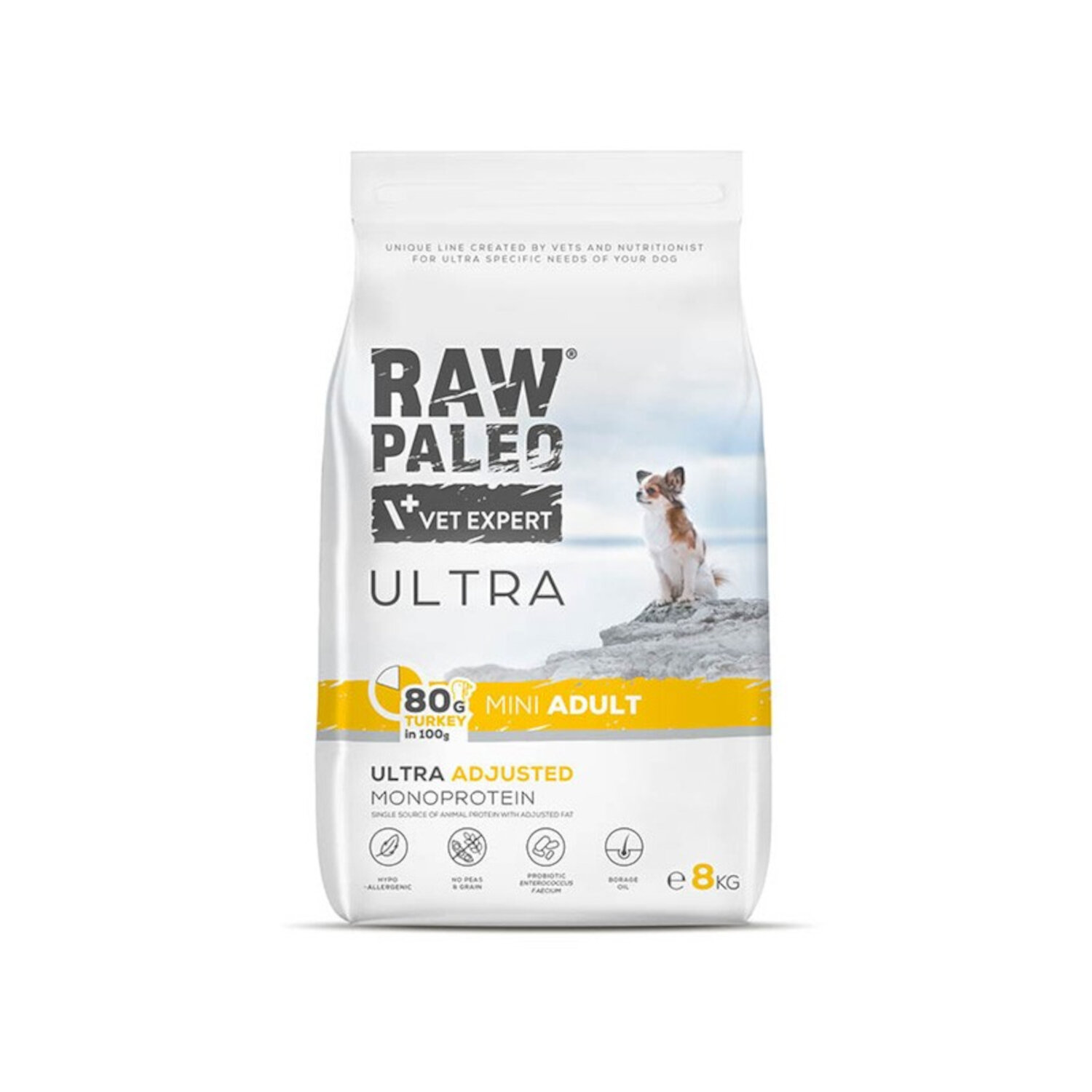 Opakowanie suchej karmy dla psów z napisem \'RAW PALEO VET EXPERT ULTRA\'. Widoczny jest mały pies na tle nieba oraz informacje o produkcie, takie jak \'80g turkey in 100g\', \'mini adult\', \'ultra adjusted monoprotein\' i waga \'8kg\'.
